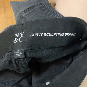 Women’s stretchy distressed jeans size 10